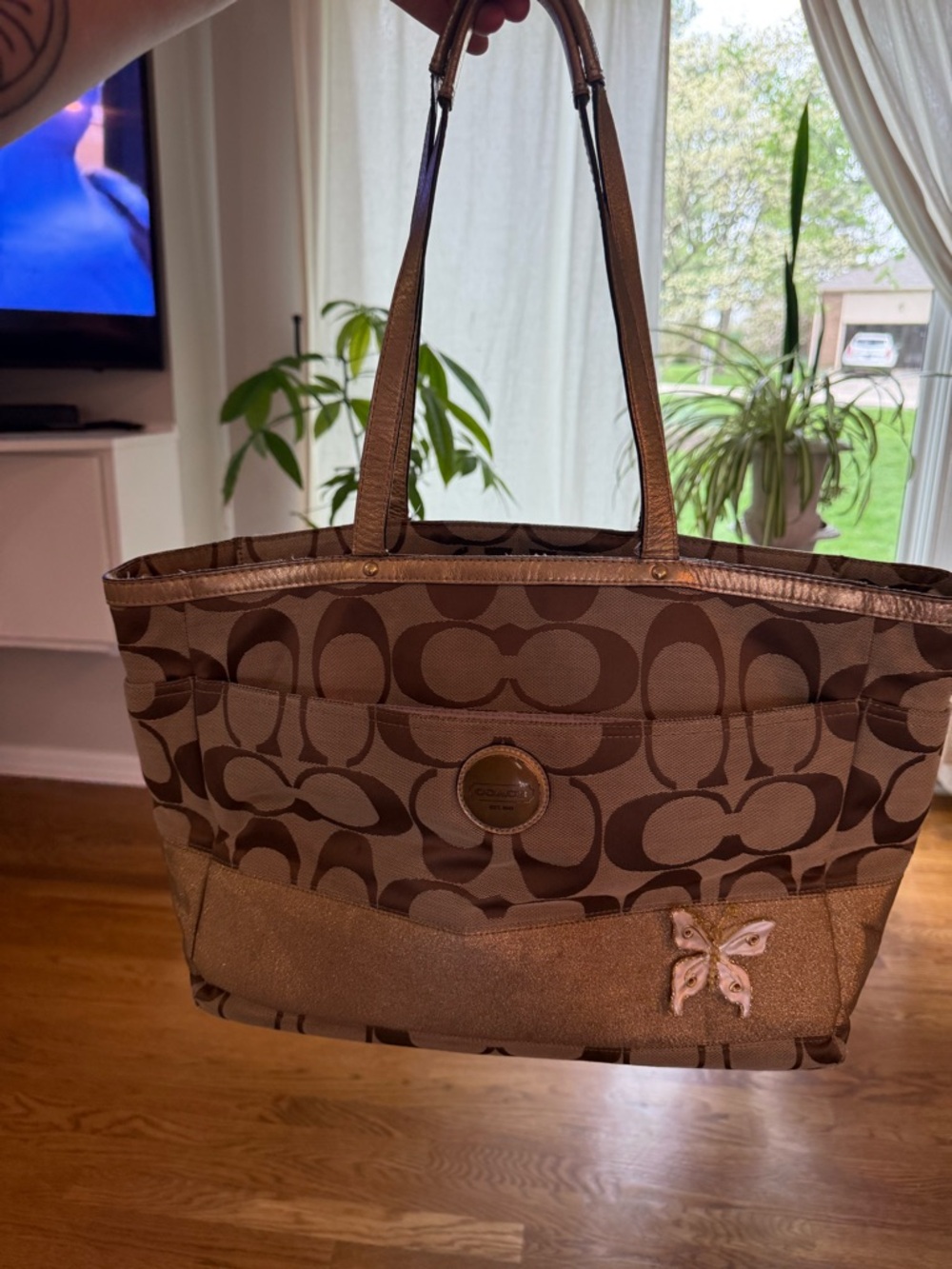 Coach Brown Signature Canvas Tote with Butterfly Accent. Good used condition.